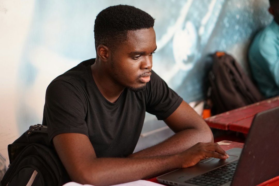 Student using a laptop to study with AI tools