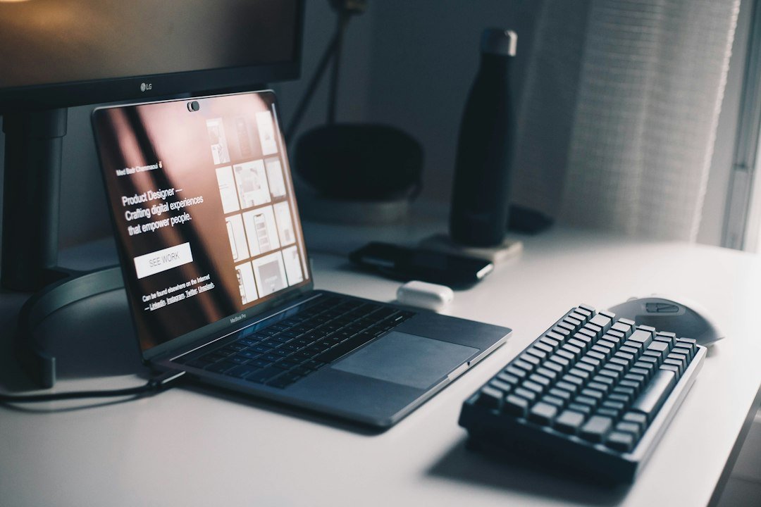 Laptop and keyboard on a desk for website design and digital marketing
